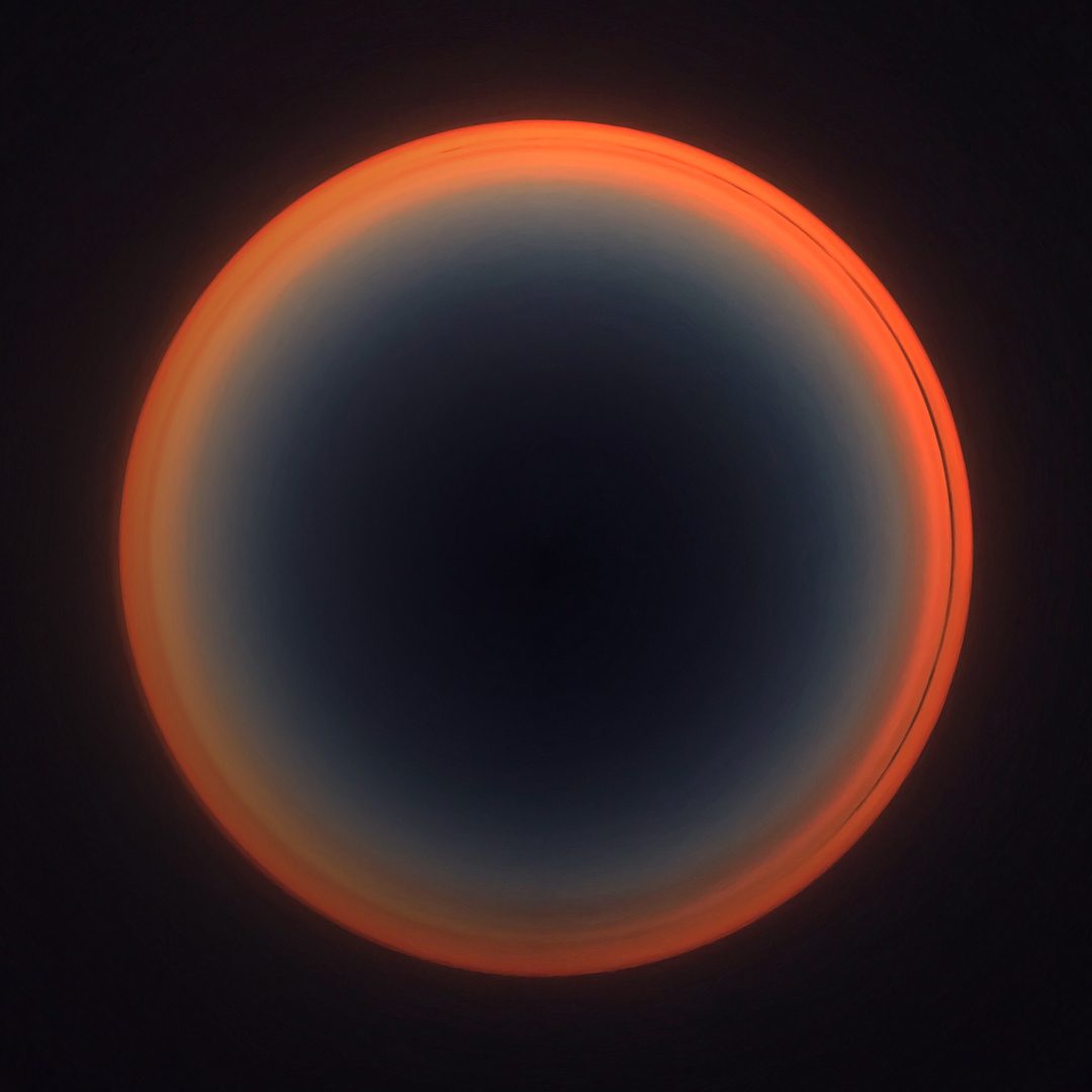 orange glowing orb with dark center